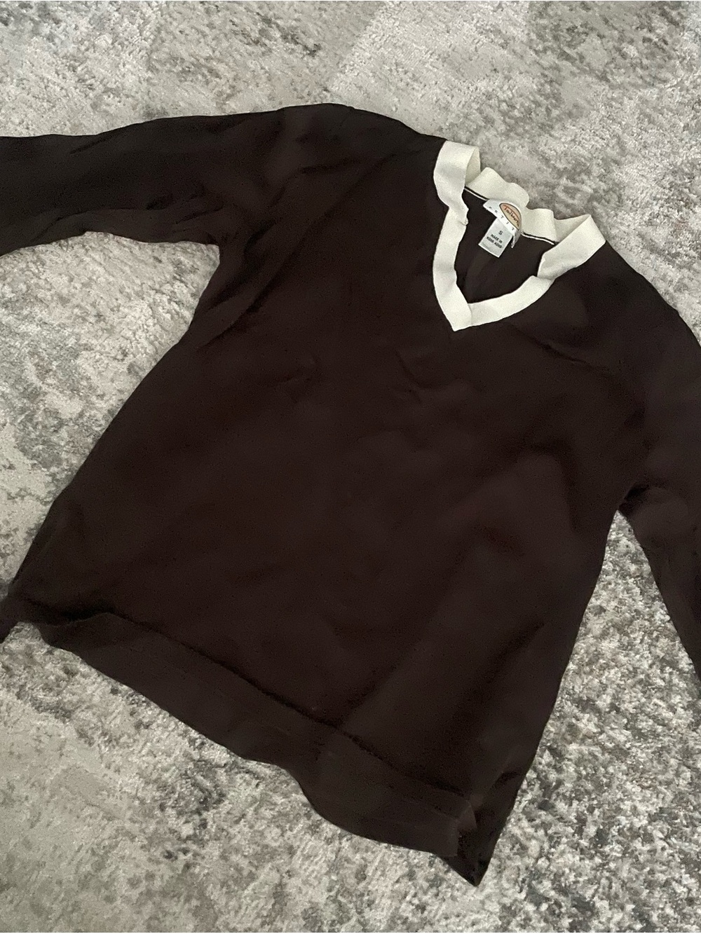 Dark brown top with cream collar
